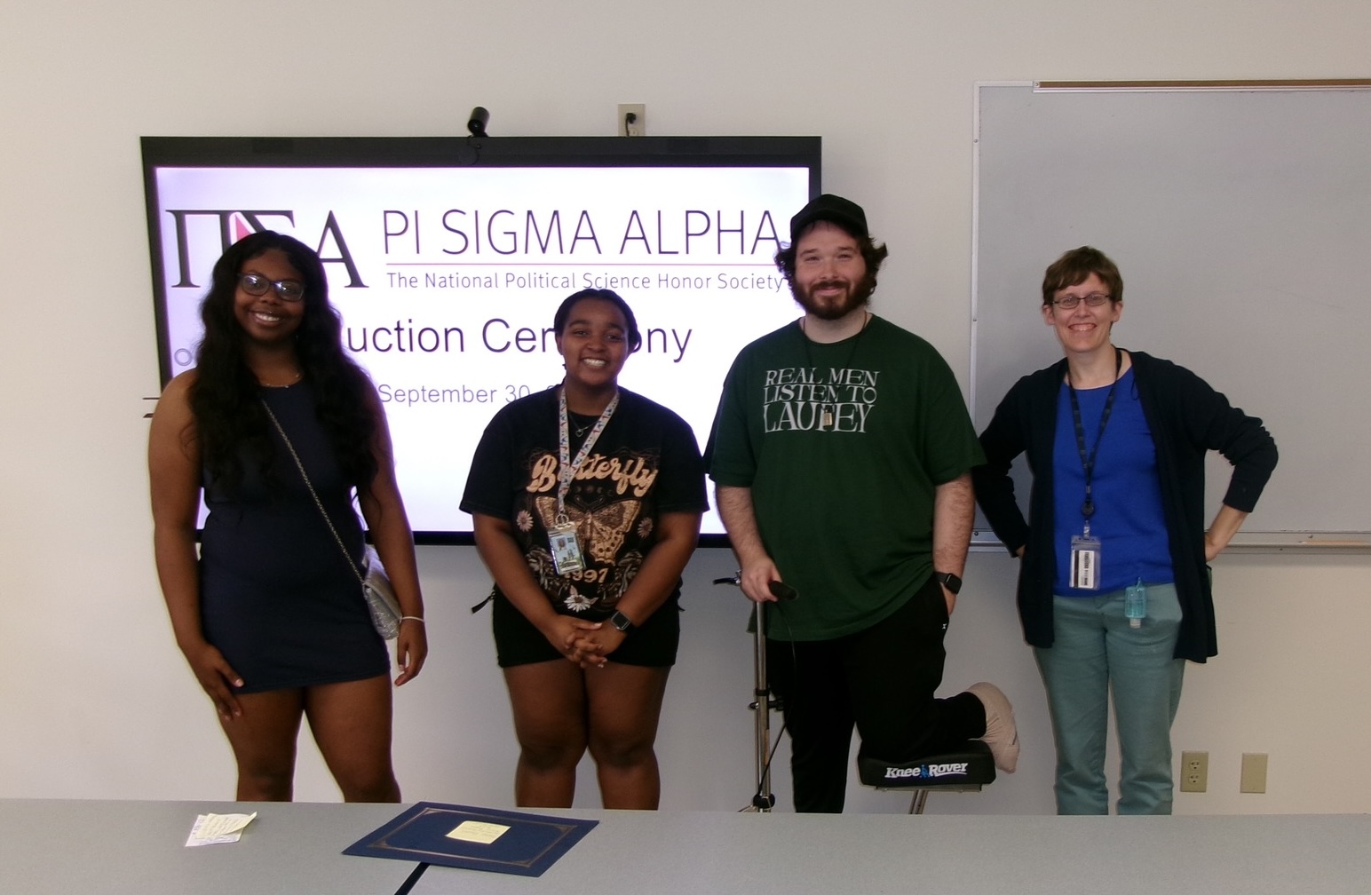 Alannah Wade vice president, Nia Walker secretary, Max McCarthy president and Dr. Elizabeth Dorssom chapter advisor.